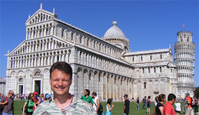 I am at the Campo dei Miracoli in Pisa (2008).  The Cathedral and Leaning Tower of Pisa are shown.